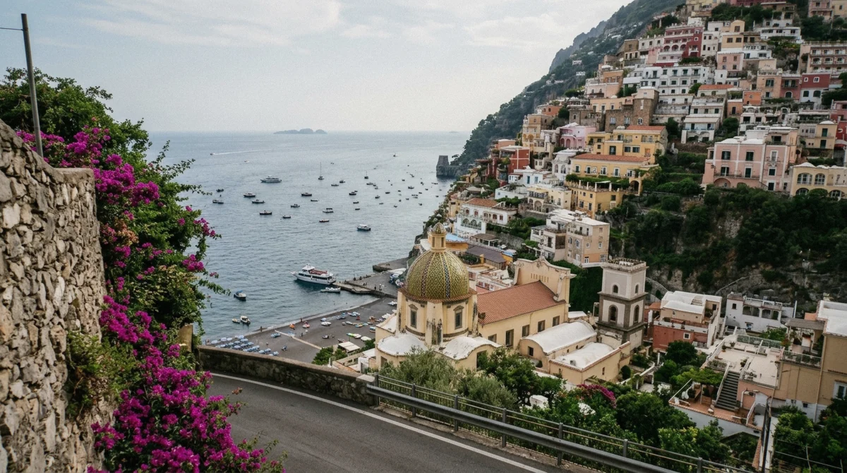 Positano seen from the SS163 coast road in the afternoon on a Pompeii and Amalfi Coast tour from Rome, Italy